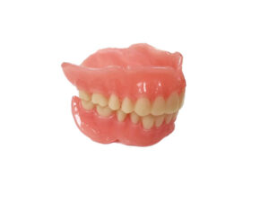 The individual parts of the printed denture are bonded together with a light cure procedure.